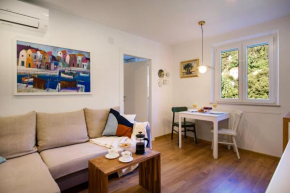 Garden view apartment - 150m from the beach - free parking